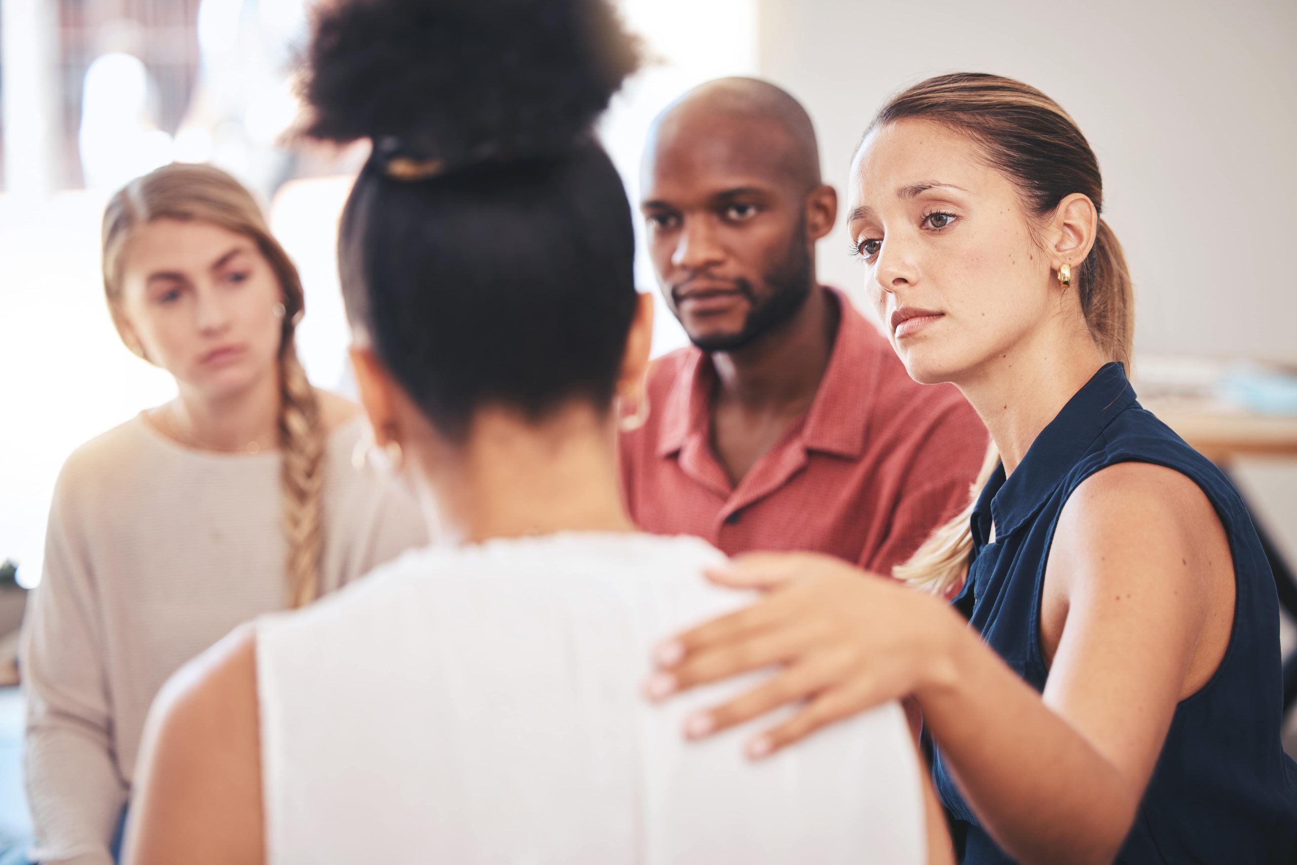 loved ones hold an intervention and talk about alcohol addiction