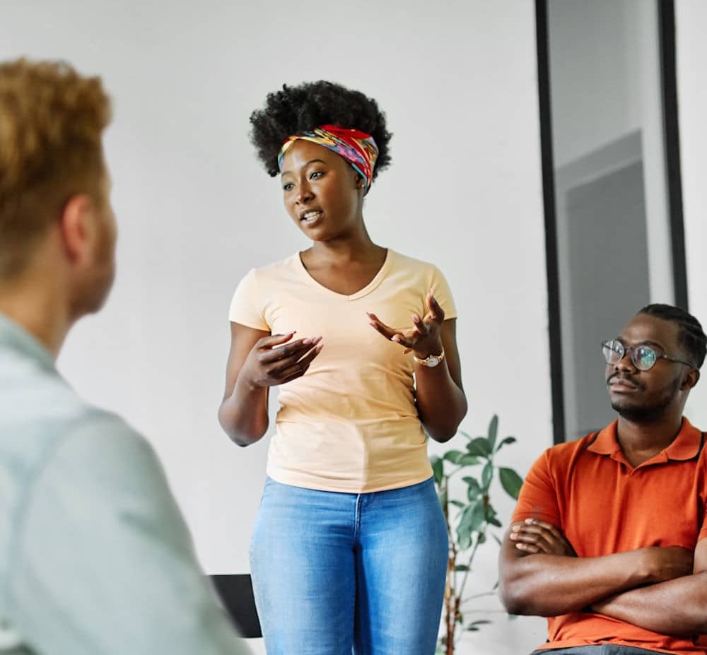 woman in group therapy session for drug abuse